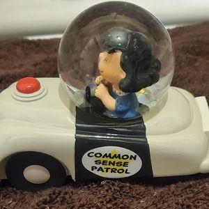 Peanuts Lucy Common Sense Patrol Car Snow Globe